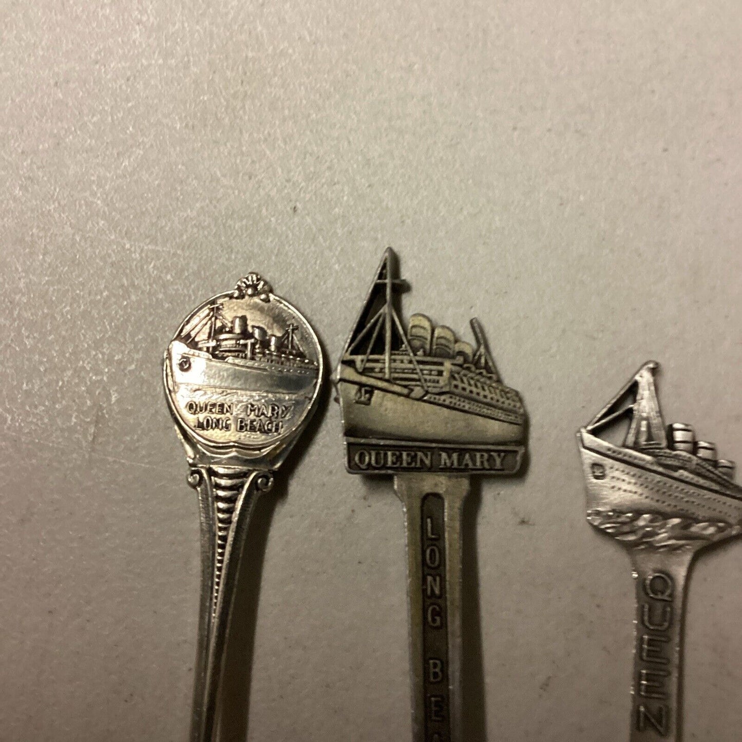 Queen Mary Lot Of 8 Souvenir Ship Spoons