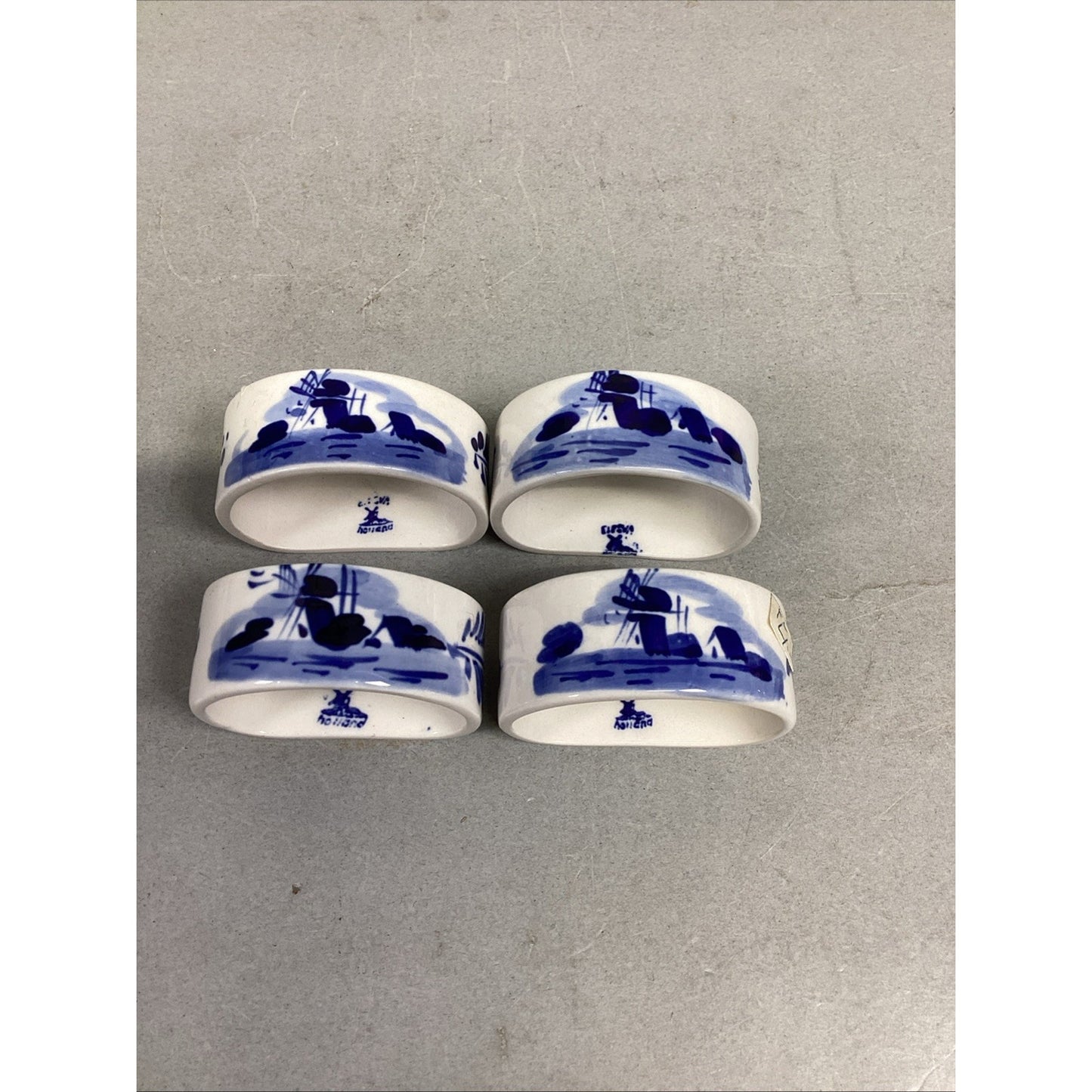 Delft Salt & Pepper Shakers W/ 4 Delft Napkin Ring Holders