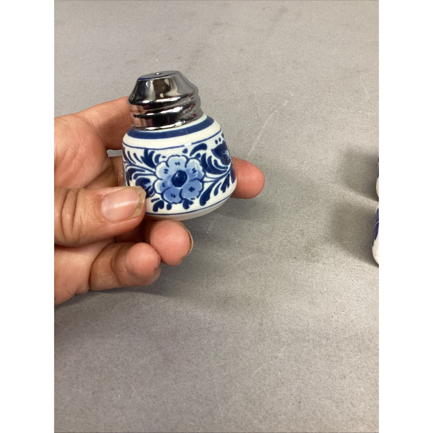 Delft Salt & Pepper Shakers W/ 4 Delft Napkin Ring Holders