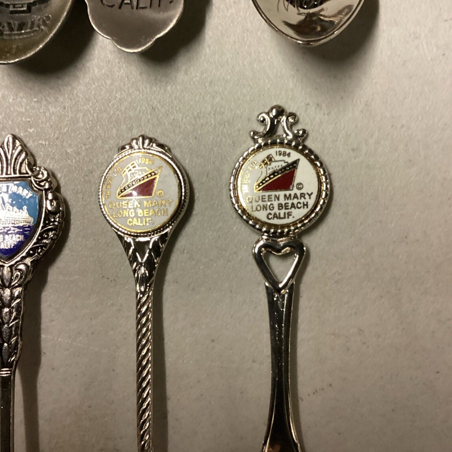 Queen Mary Lot Of 8 Souvenir Ship Spoons