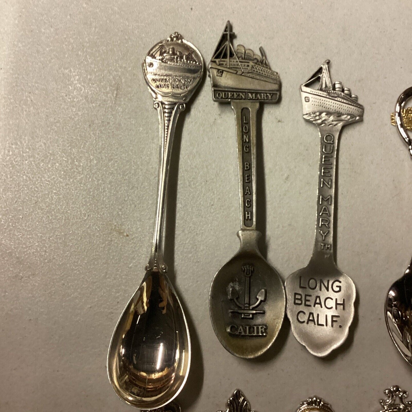 Queen Mary Lot Of 8 Souvenir Ship Spoons