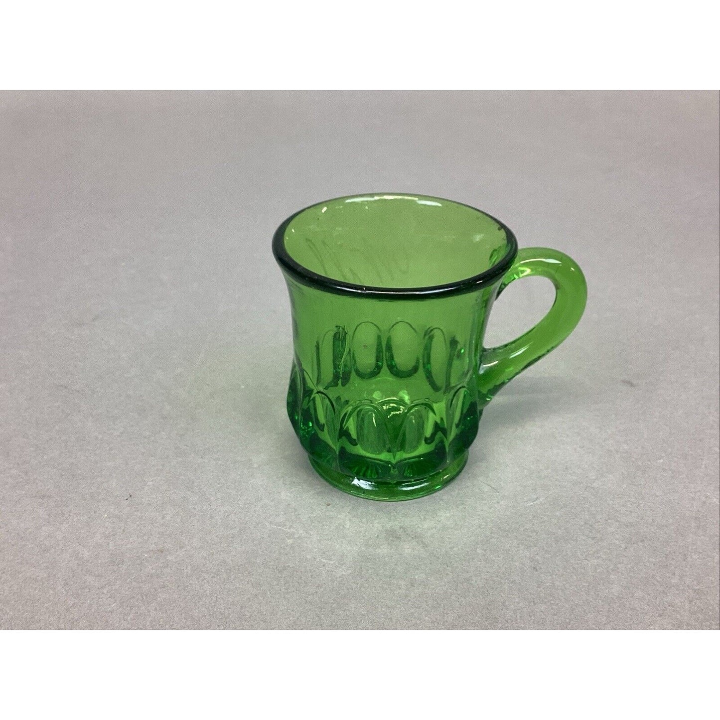 EAPG US Glass Arched Ovals Green Antique 2.5” Souvenir Mug 1905 - ‘Wilbur’.