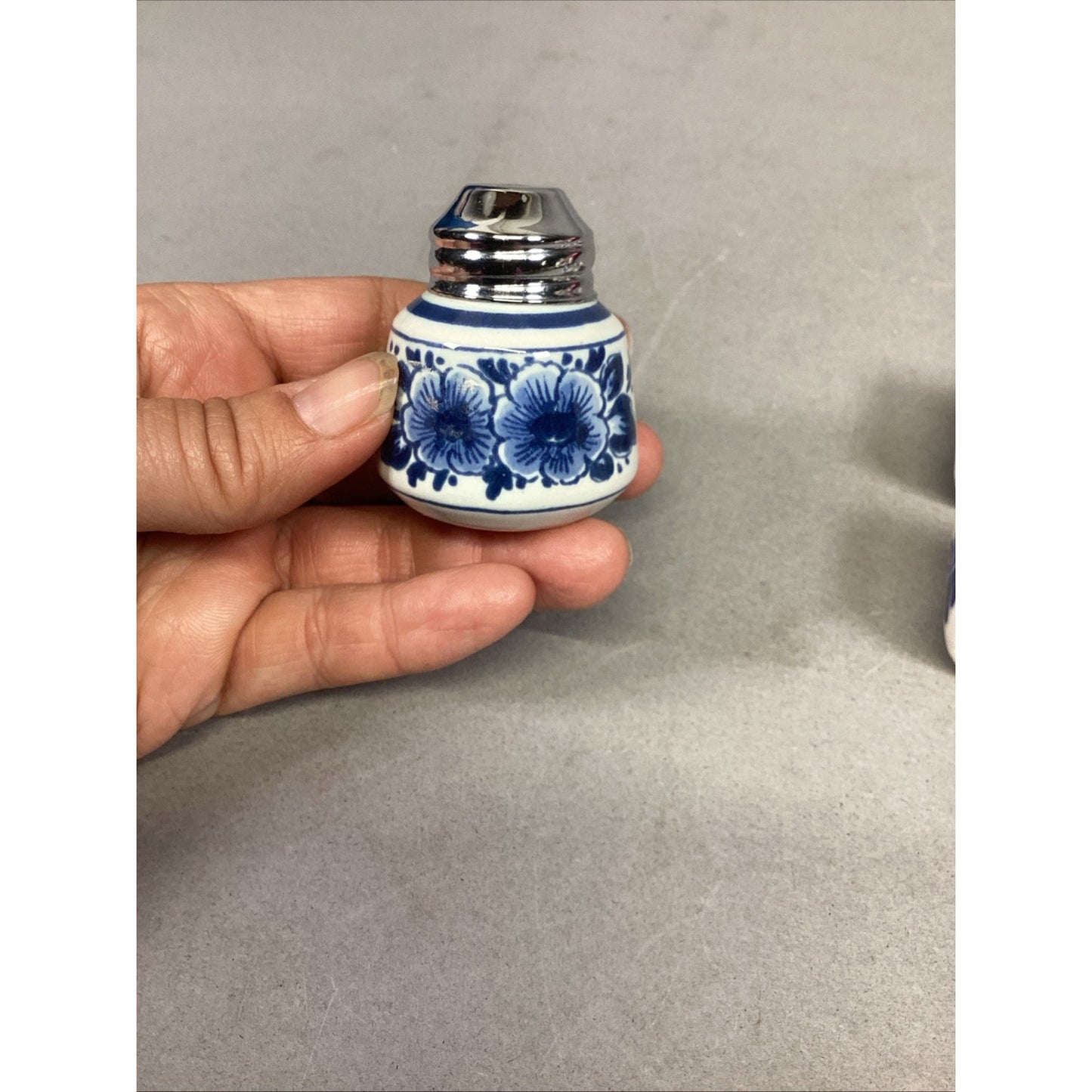 Delft Salt & Pepper Shakers W/ 4 Delft Napkin Ring Holders