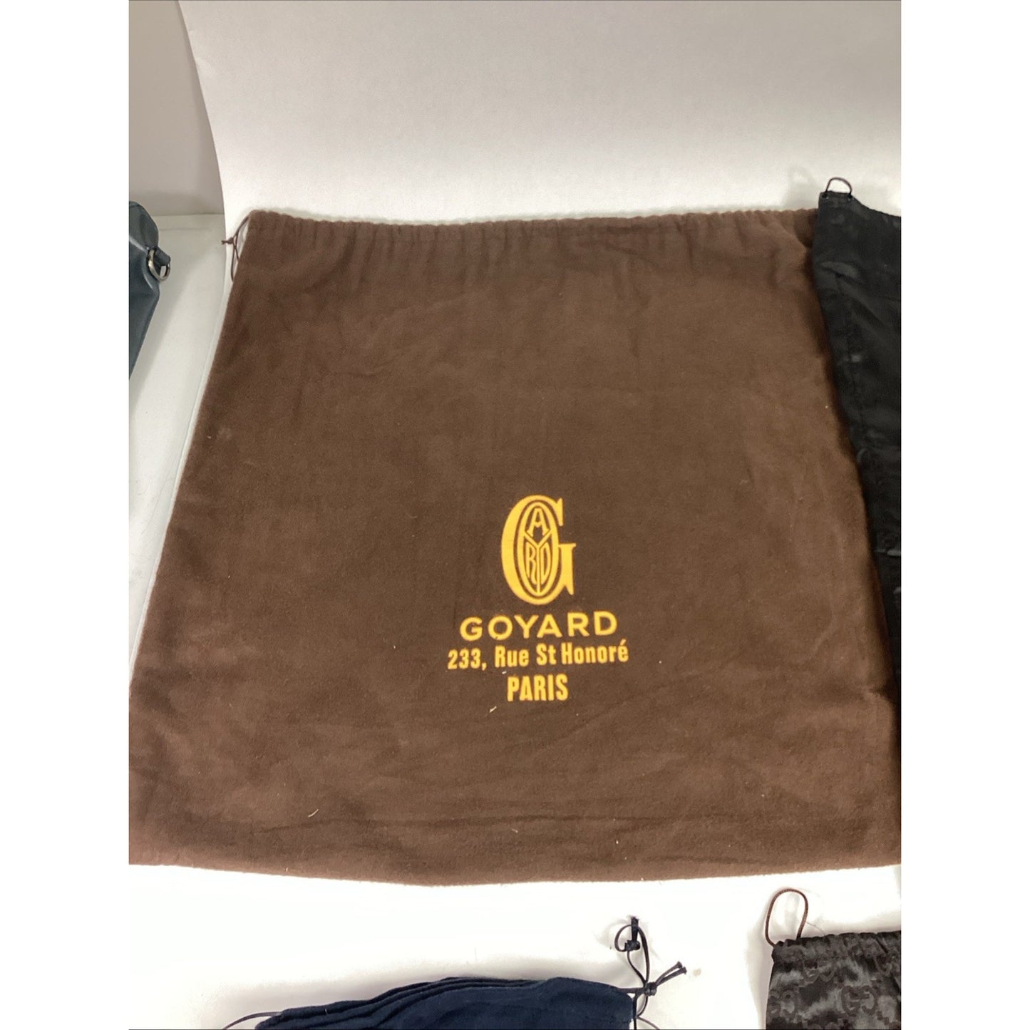 Goyard Fleece Drawstring Bag, Blue Prada Fleece, Gucci & YSL Satin Bag