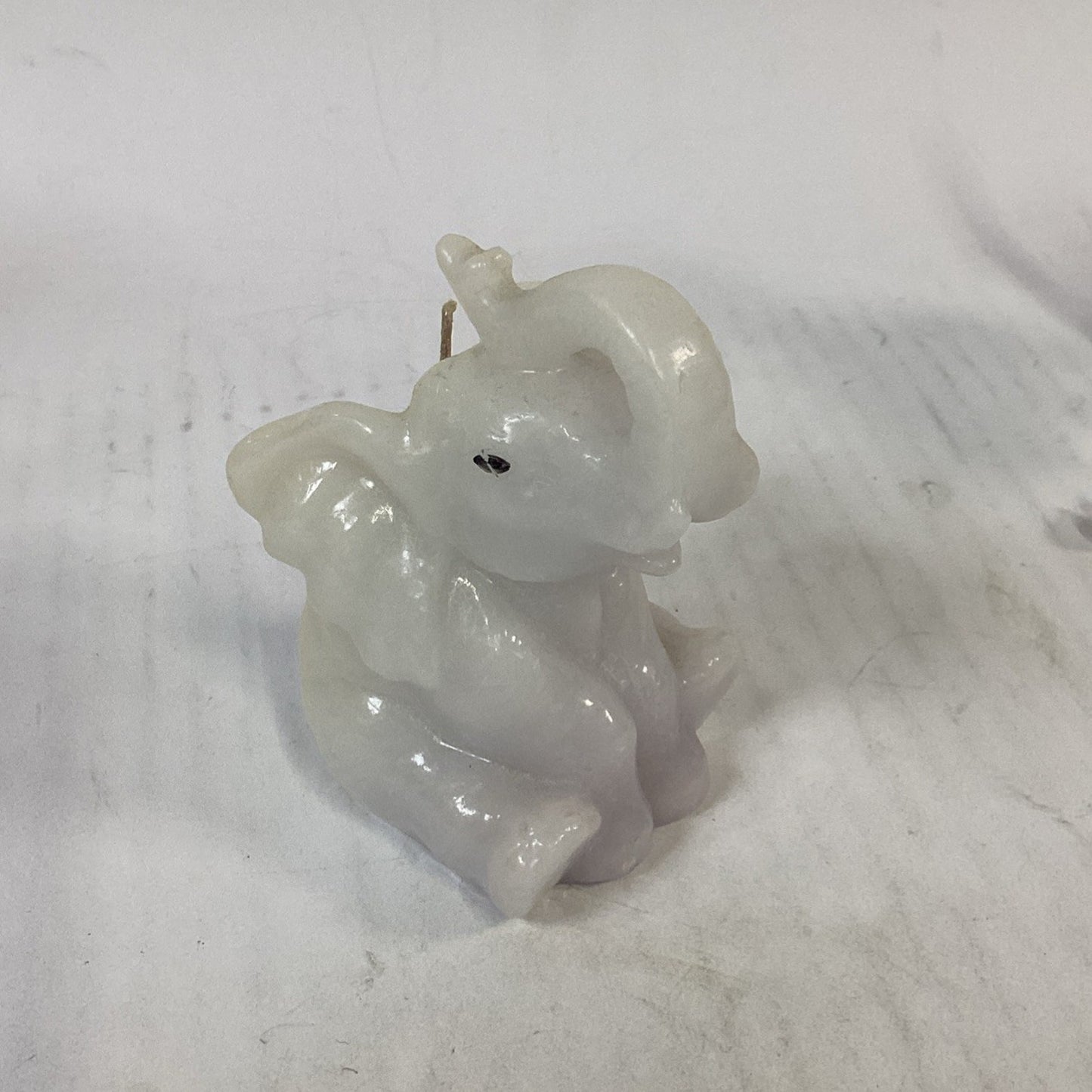 Lot of 3 Elephants - Candle, Figurine And Pin