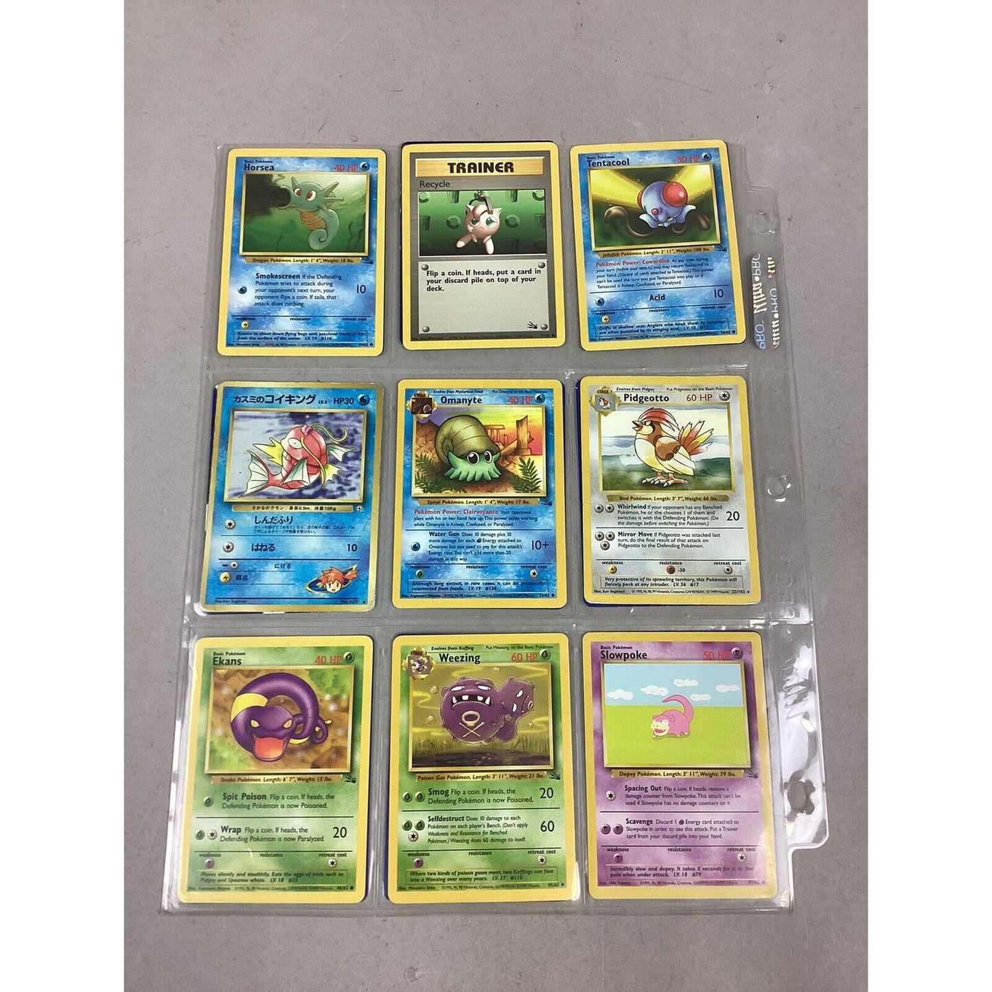 Lot Of 105 Collectible Pokémon Cards & 1 Sheet of Pokémon Stickers