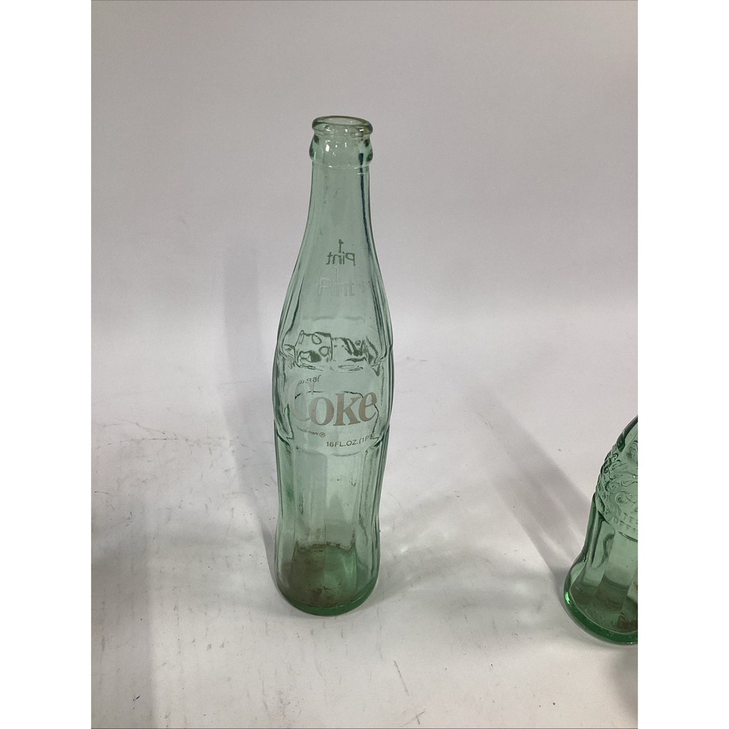 Lot of 7 Vintage Green Glass 16 Oz 1 Pint Coca Cola Bottles
