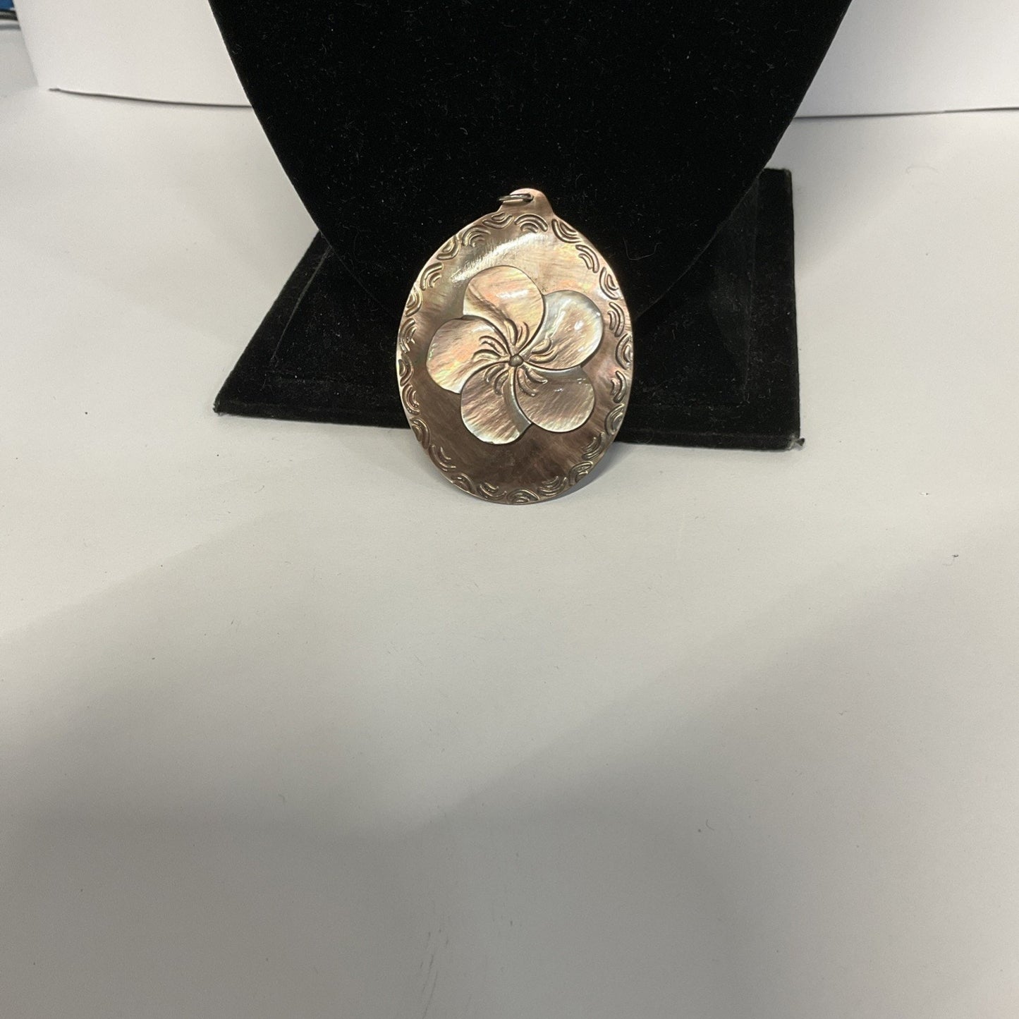 Hibiscus Carved Shell Pendant Iridescent