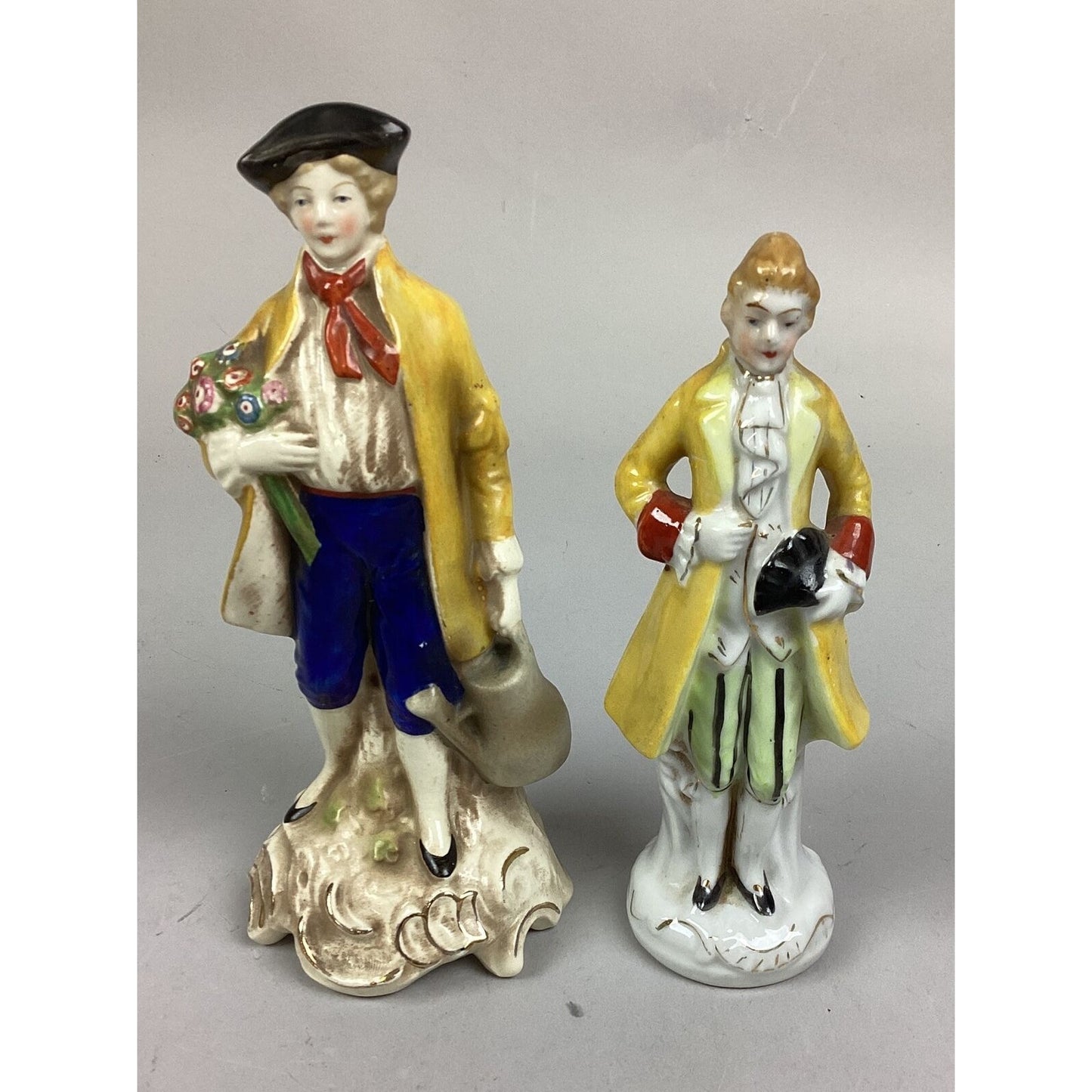 Lot Of 2 Vintage Porcelain Figurines- Man Holding Flowers & Watering Can - 7 3/4