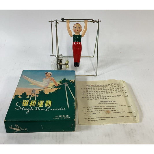 Vintage NOS Wind Up Trapeze Single Bar Exercise Toy China - Opened Box