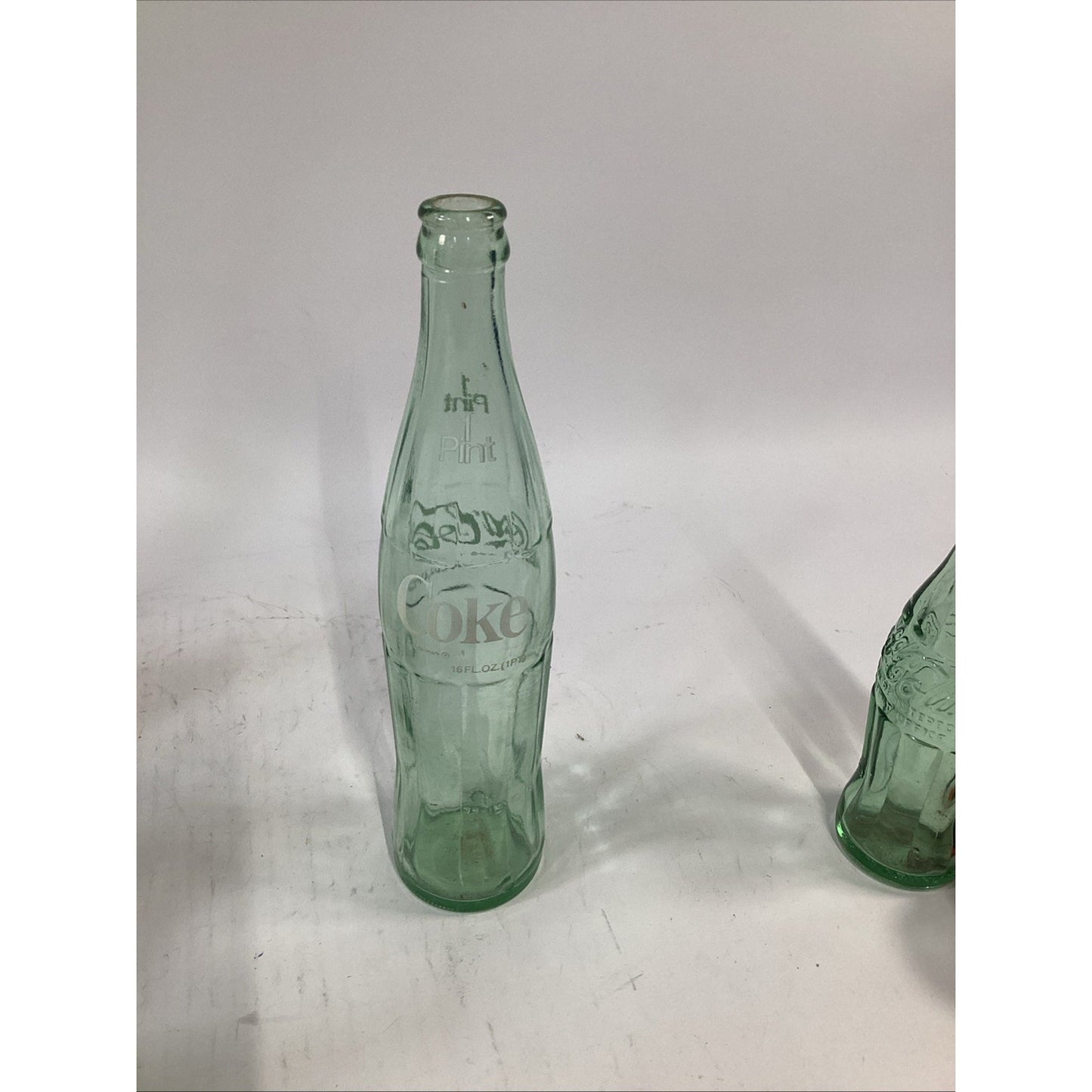 Lot of 7 Vintage Green Glass 16 Oz 1 Pint Coca Cola Bottles