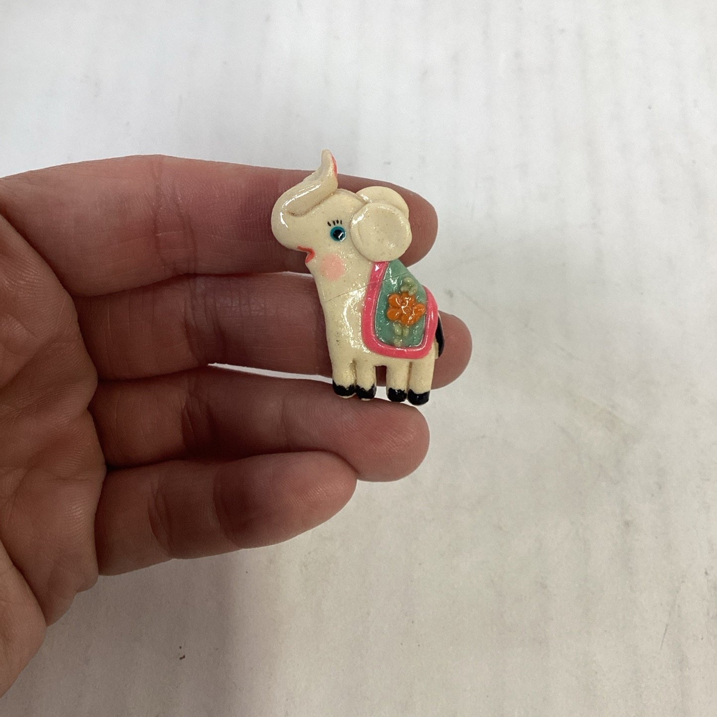Lot of 3 Elephants - Candle, Figurine And Pin