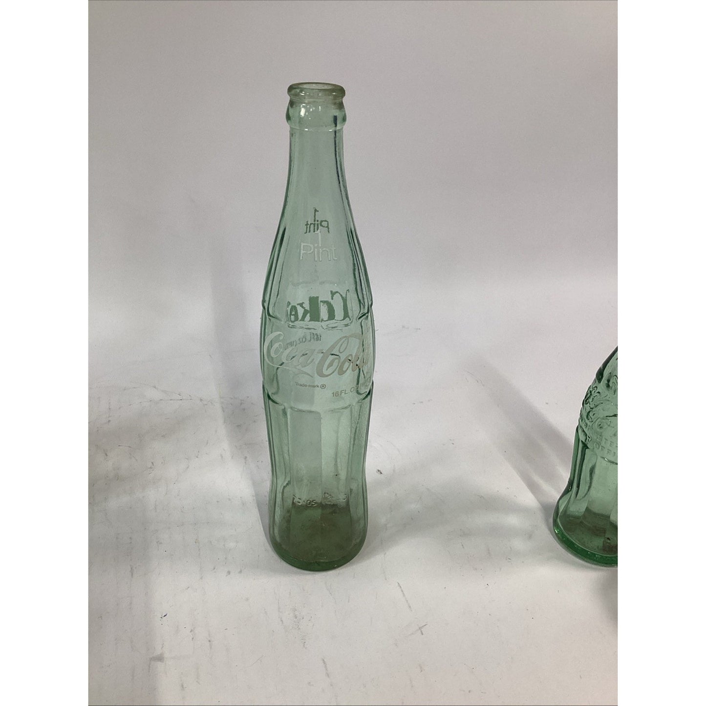 Lot of 7 Vintage Green Glass 16 Oz 1 Pint Coca Cola Bottles