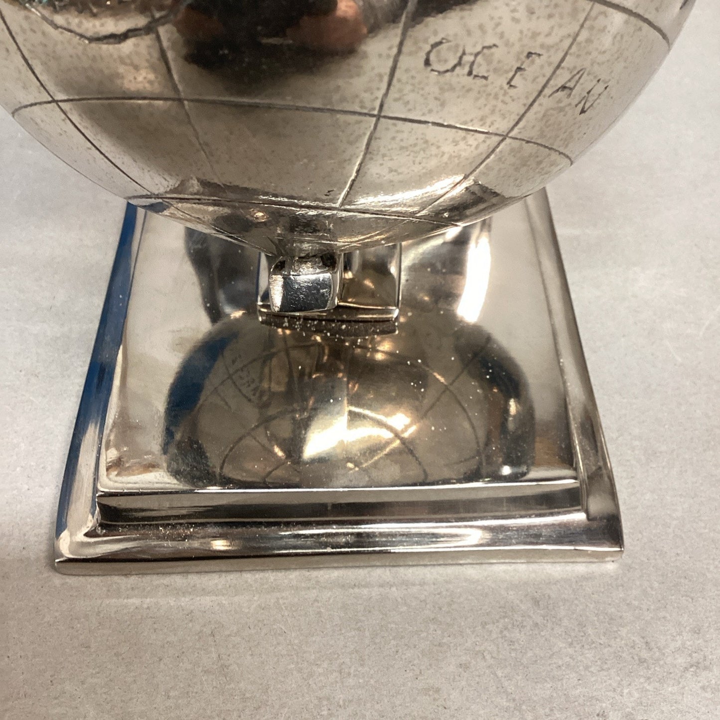 Aluminum Globe Bookends - Nickel Plated - Globes Spin