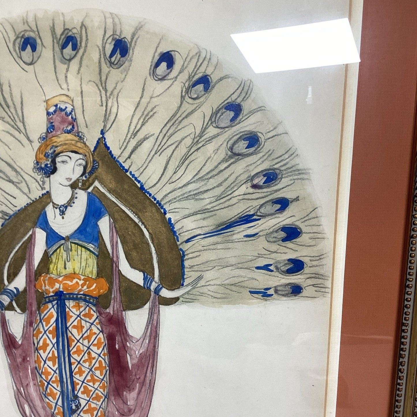 Woman With Peacock Feathers Framed Art - 23x19.5”