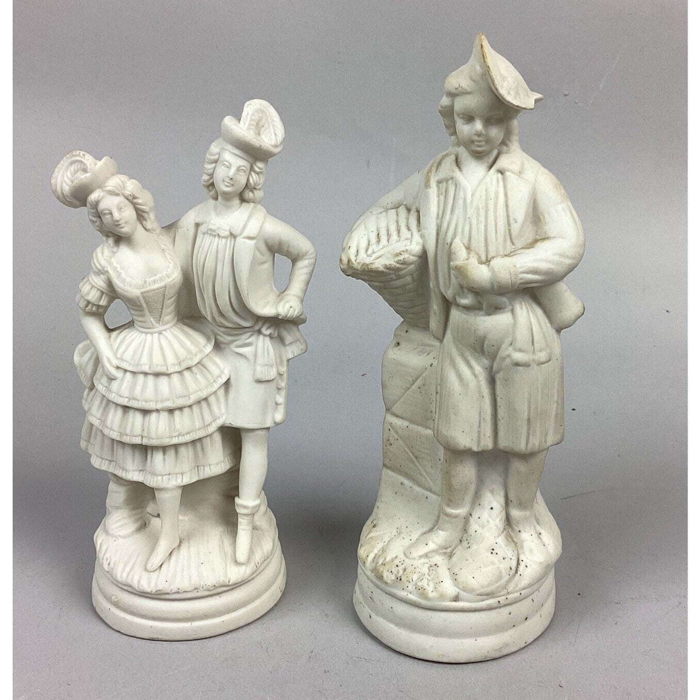 2 Antique Bisque Porcelain Figurines
