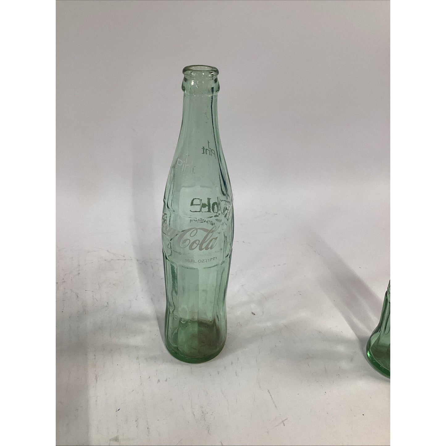 Lot of 7 Vintage Green Glass 16 Oz 1 Pint Coca Cola Bottles
