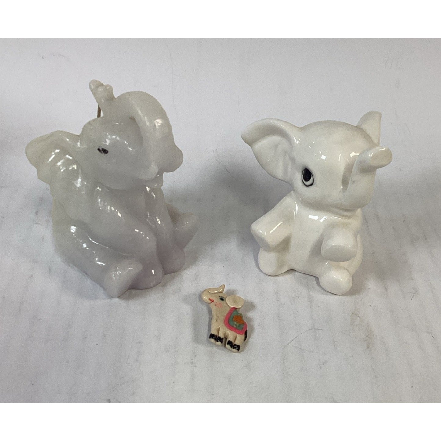Lot of 3 Elephants - Candle, Figurine And Pin