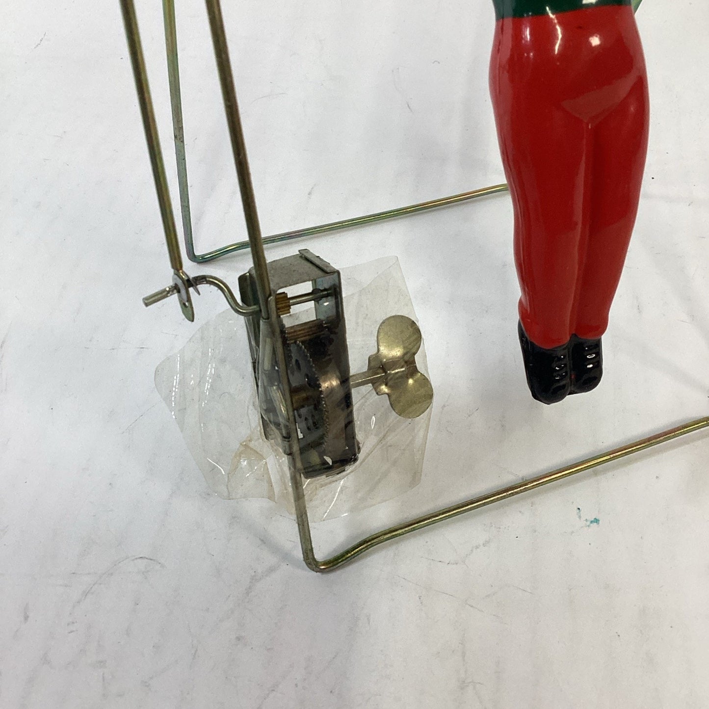Vintage NOS Wind Up Trapeze Single Bar Exercise Toy China - Opened Box