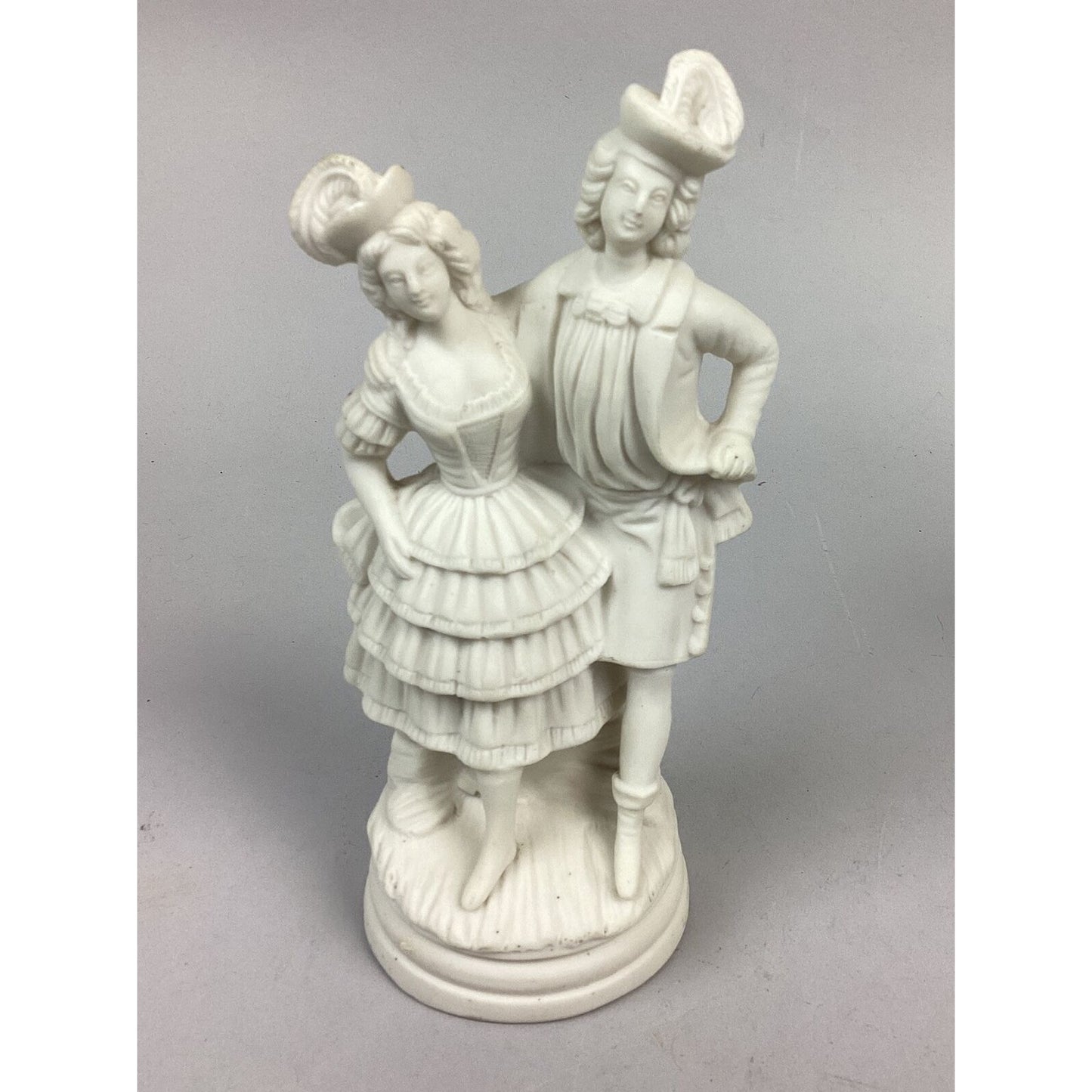 2 Antique Bisque Porcelain Figurines