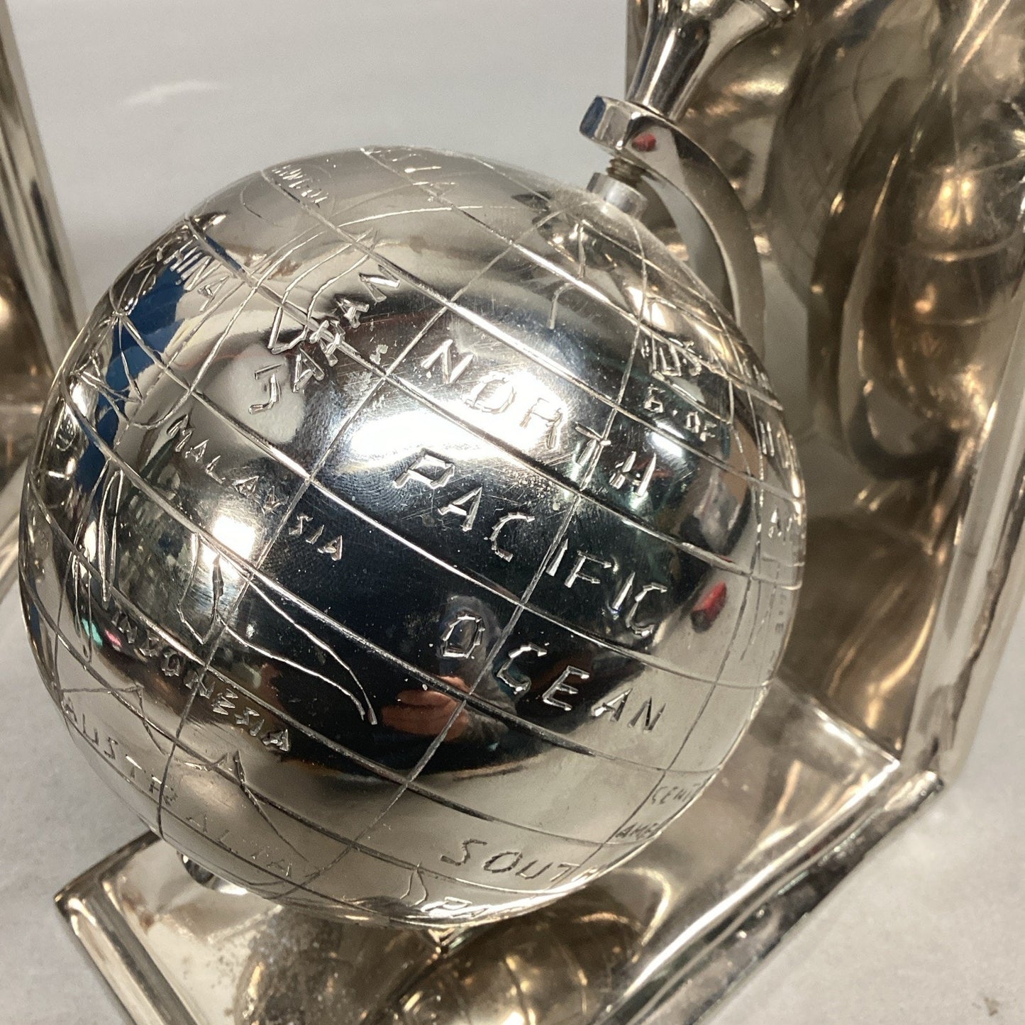 Aluminum Globe Bookends - Nickel Plated - Globes Spin