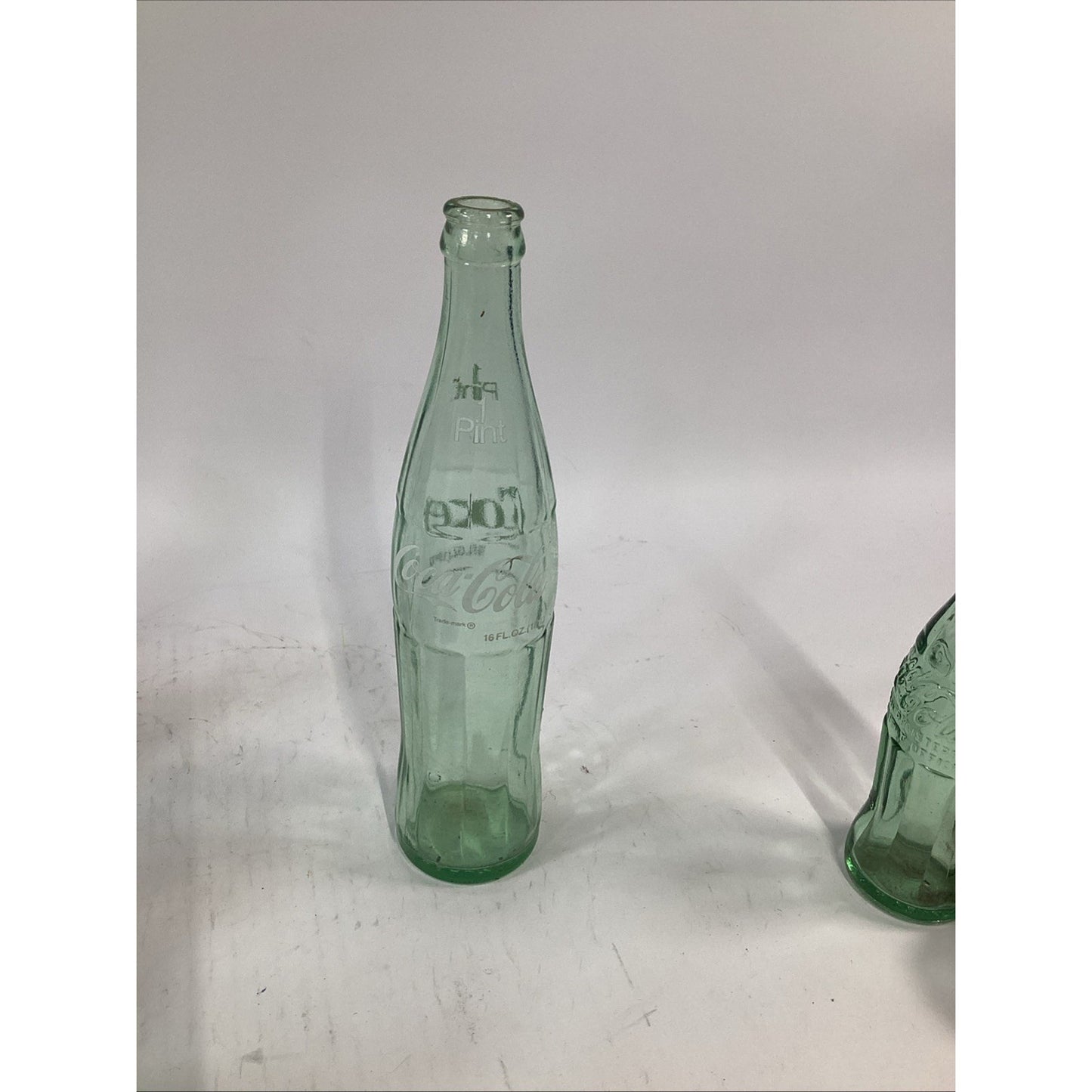 Lot of 7 Vintage Green Glass 16 Oz 1 Pint Coca Cola Bottles