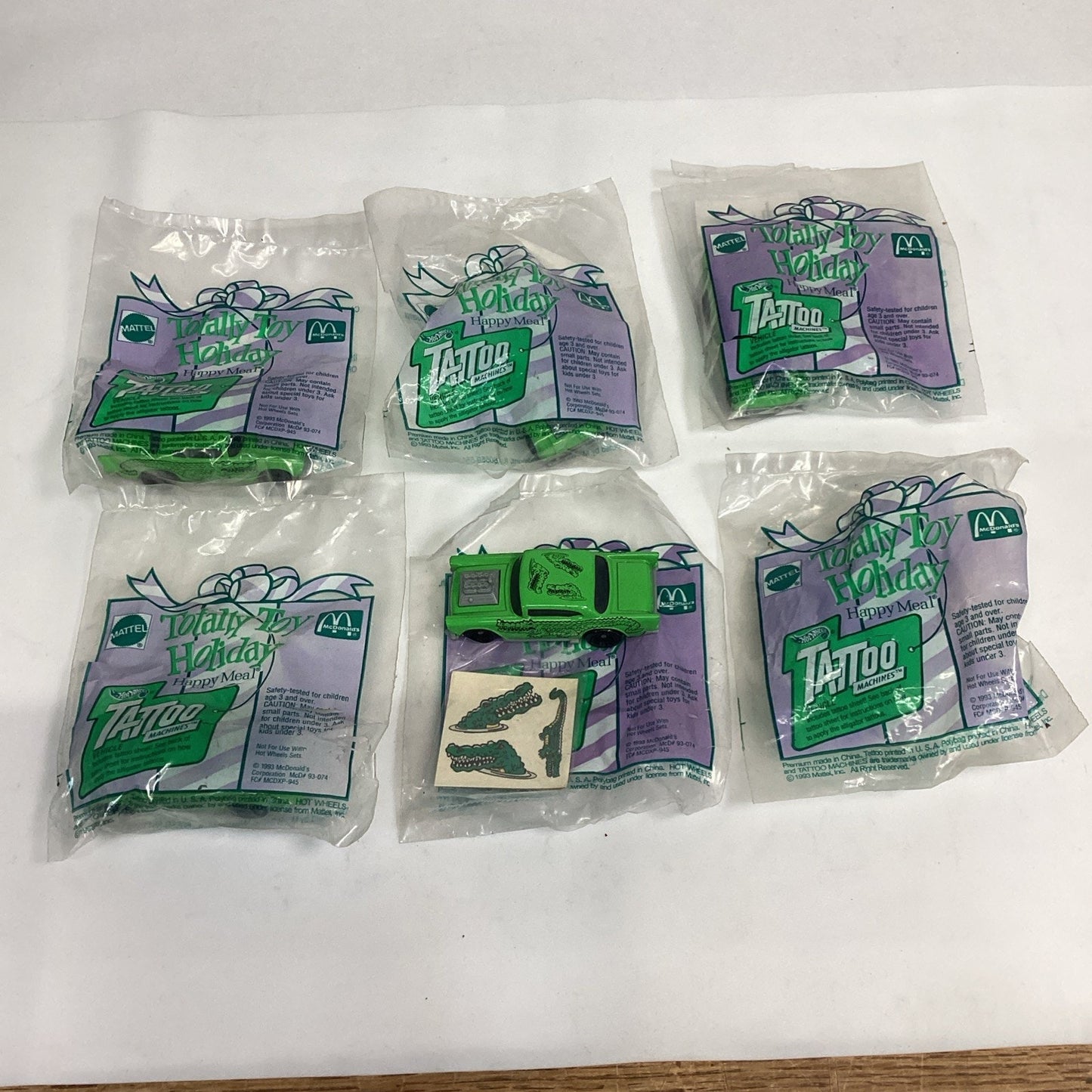Set Of 6 - 1993 Hot Wheels Totally Toy Holiday Tattoo Machines - McDonald’s