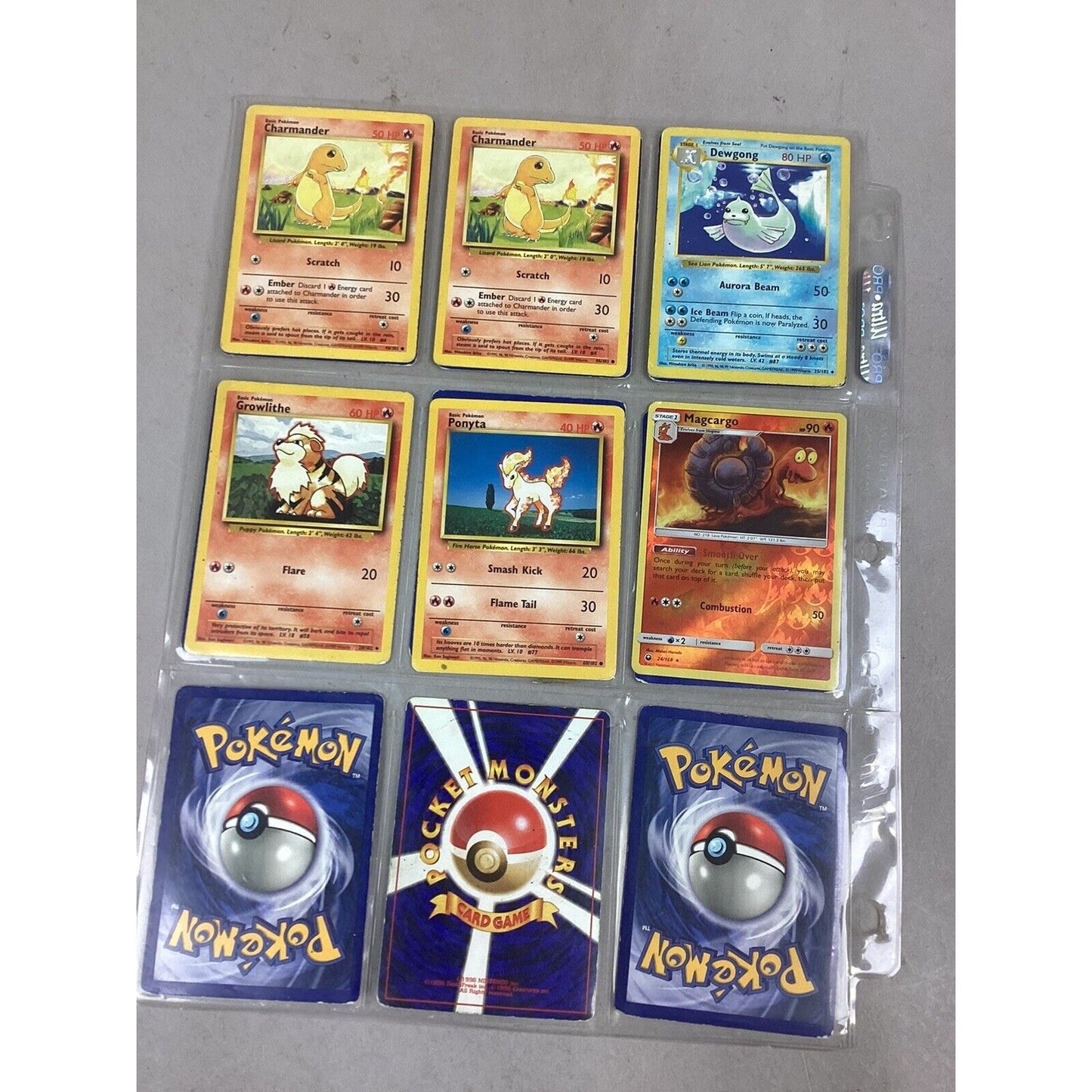 Lot Of 105 Collectible Pokémon Cards & 1 Sheet of Pokémon Stickers