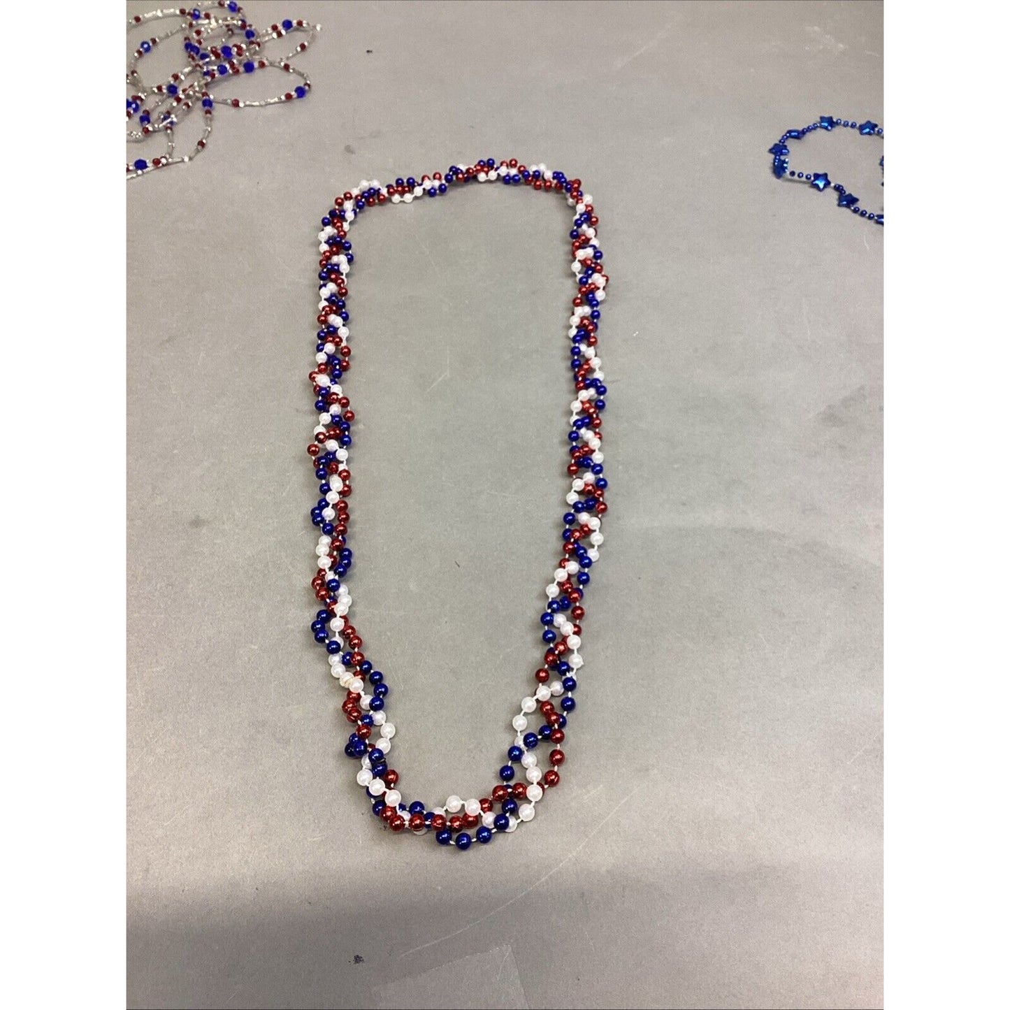 EC Red Garland (Damaged), 2 Other Garlands & 7 Red White Blue Stars Necklaces