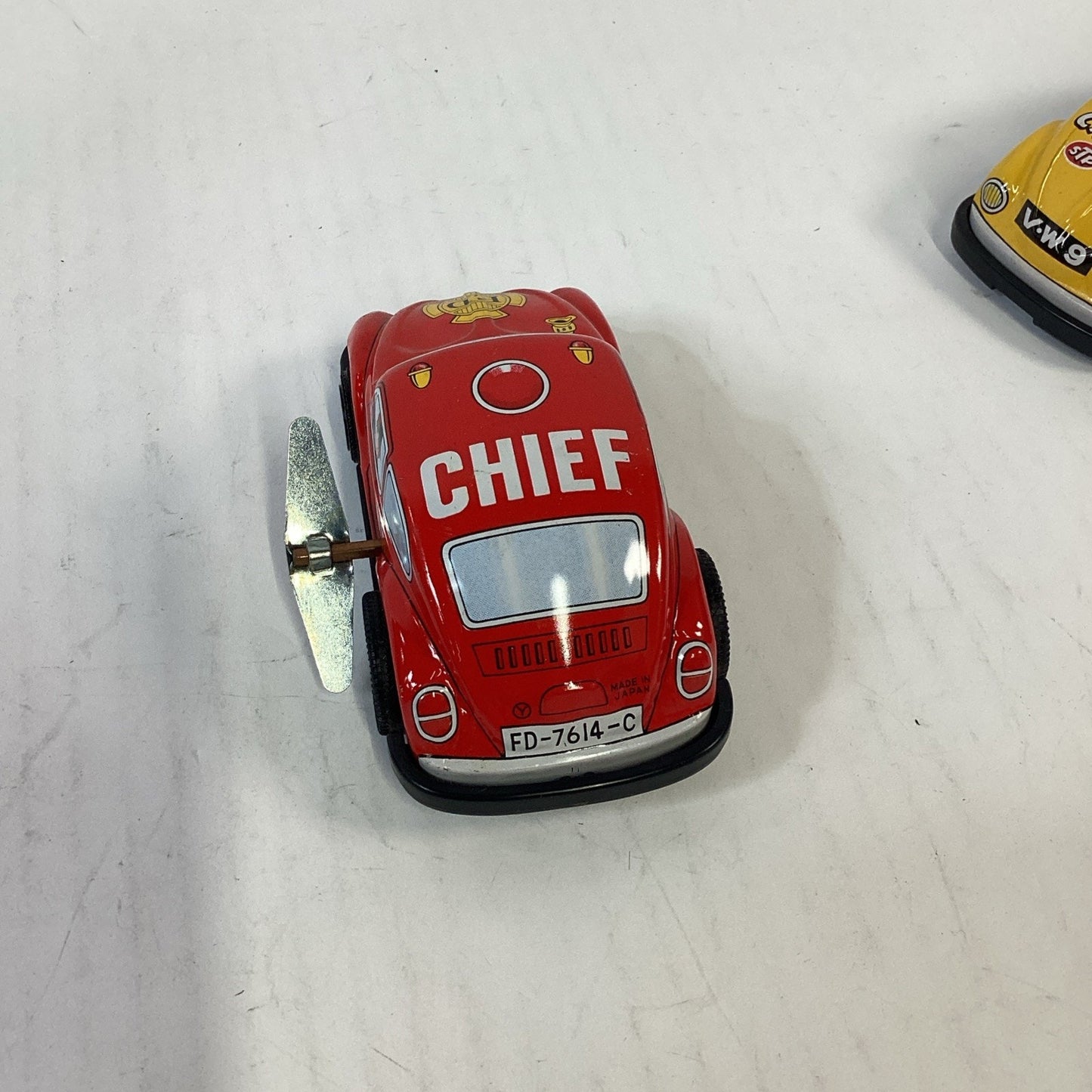 Vintage Lot of 2 Volkswagon Beetle Fire Chief/Racing Wind Up Tin Litho Japan