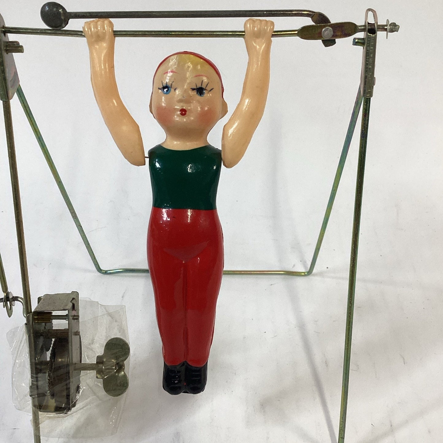 Vintage NOS Wind Up Trapeze Single Bar Exercise Toy China - Opened Box