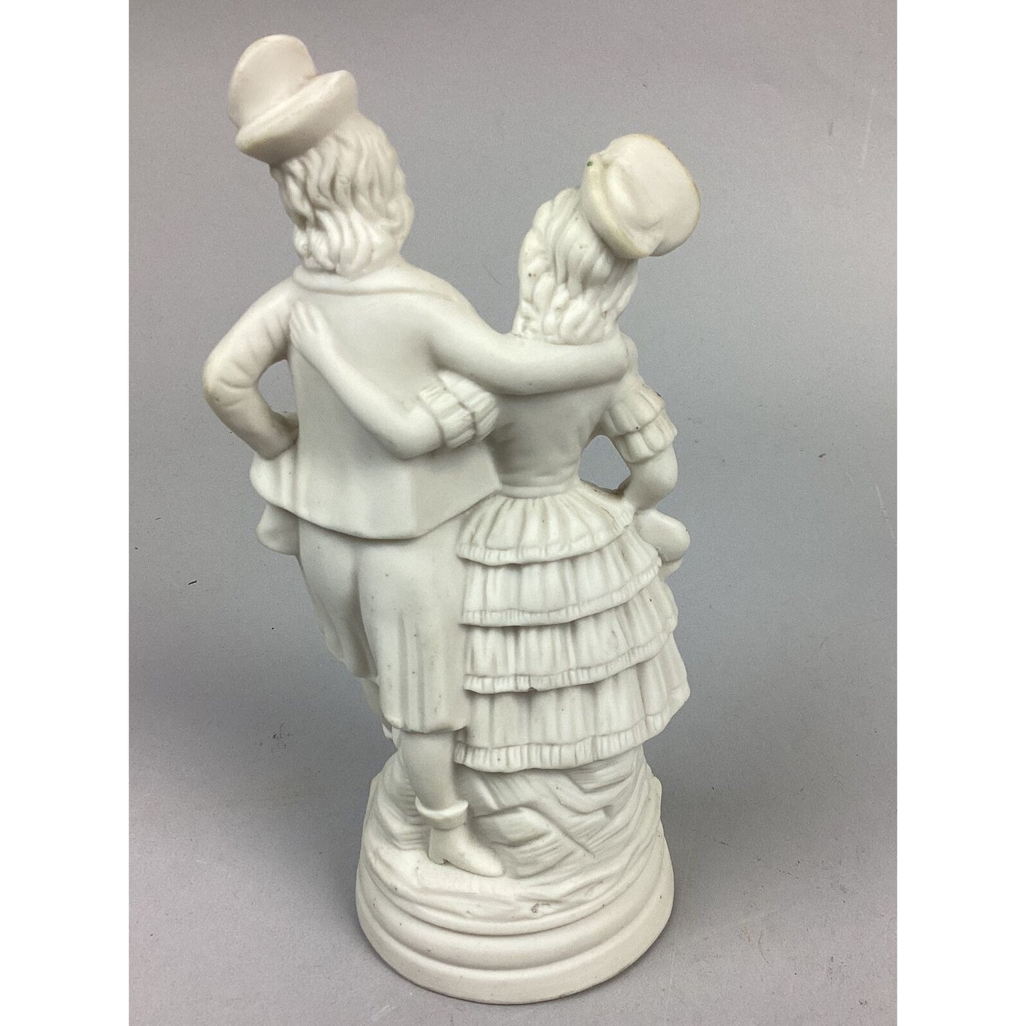2 Antique Bisque Porcelain Figurines