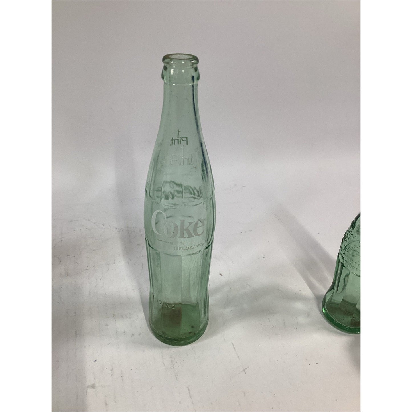 Lot of 7 Vintage Green Glass 16 Oz 1 Pint Coca Cola Bottles