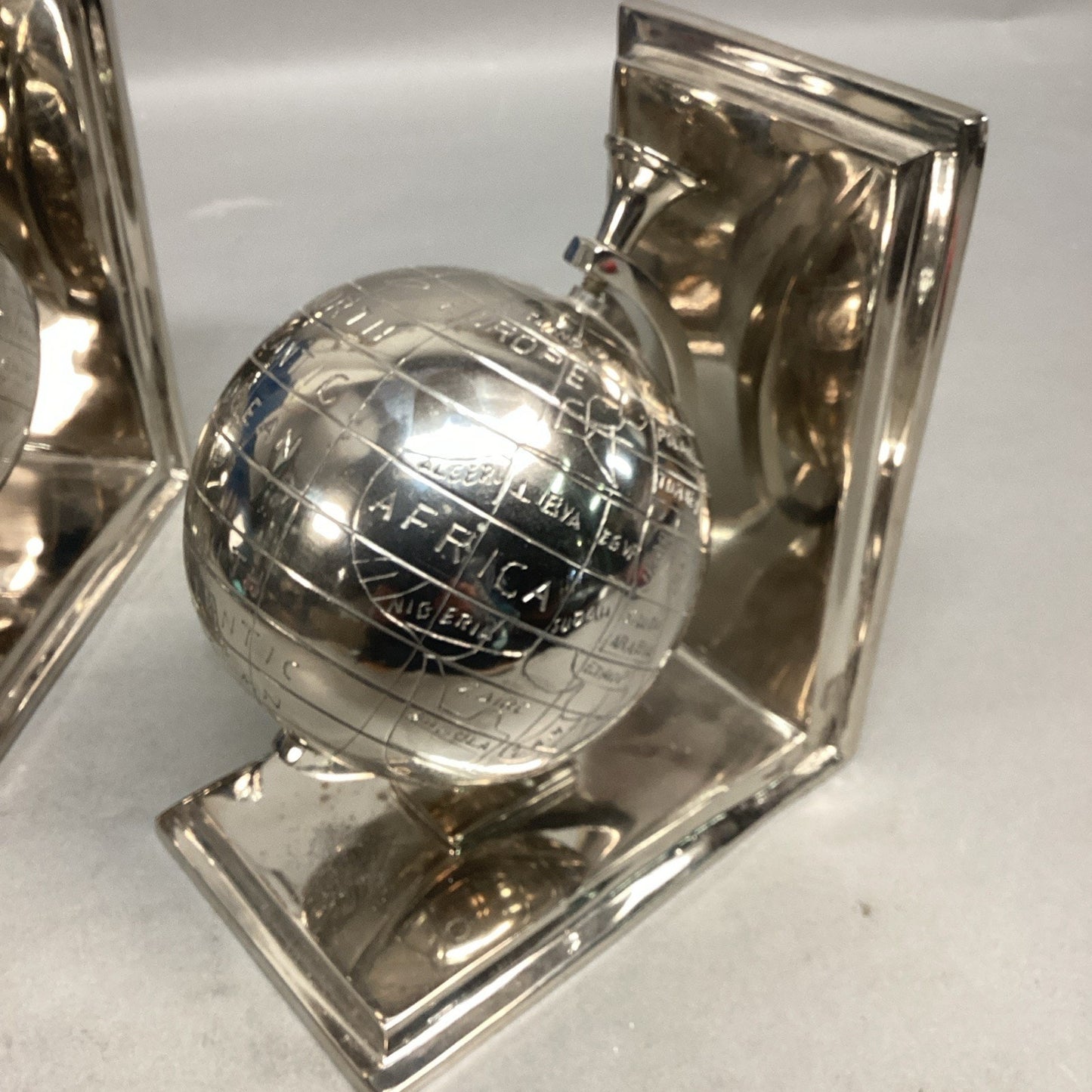 Aluminum Globe Bookends - Nickel Plated - Globes Spin