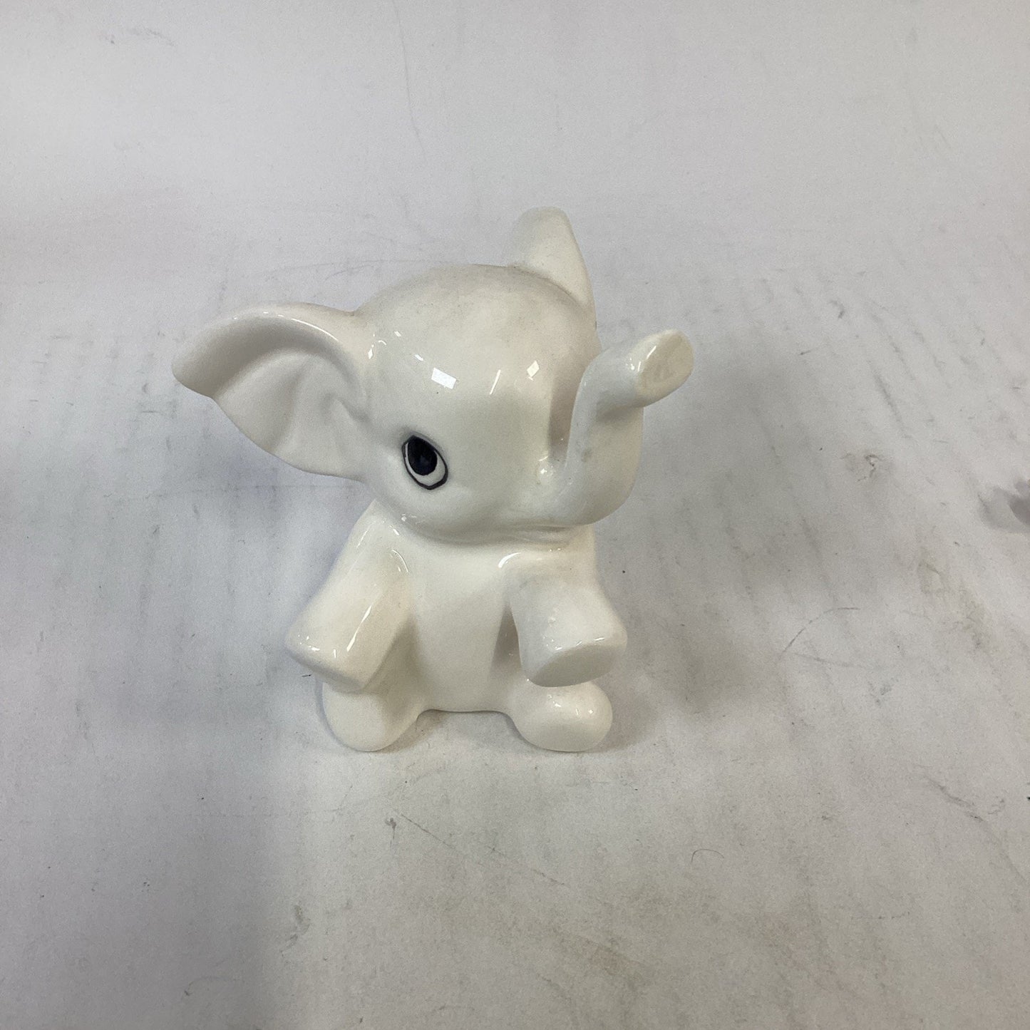Lot of 3 Elephants - Candle, Figurine And Pin