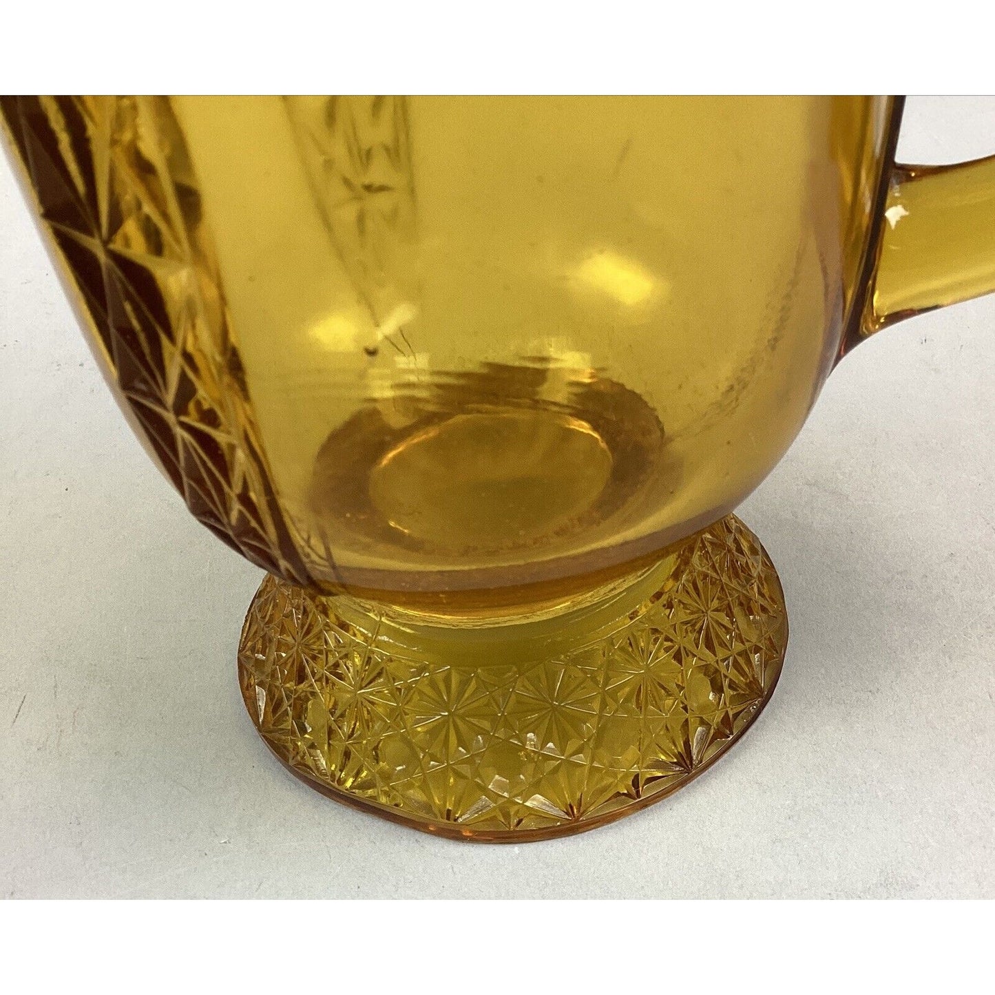 Vintage McKee Queen Daisy & Buttons Amber Glass Footed Pitcher - 8 1/4”