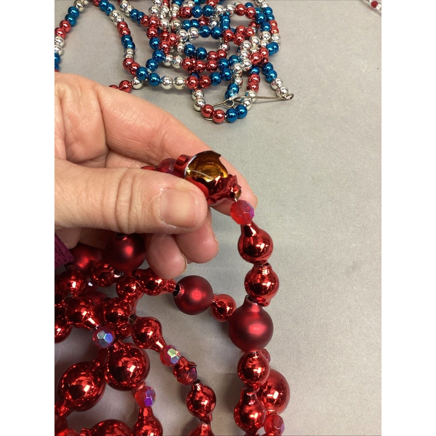 EC Red Garland (Damaged), 2 Other Garlands & 7 Red White Blue Stars Necklaces