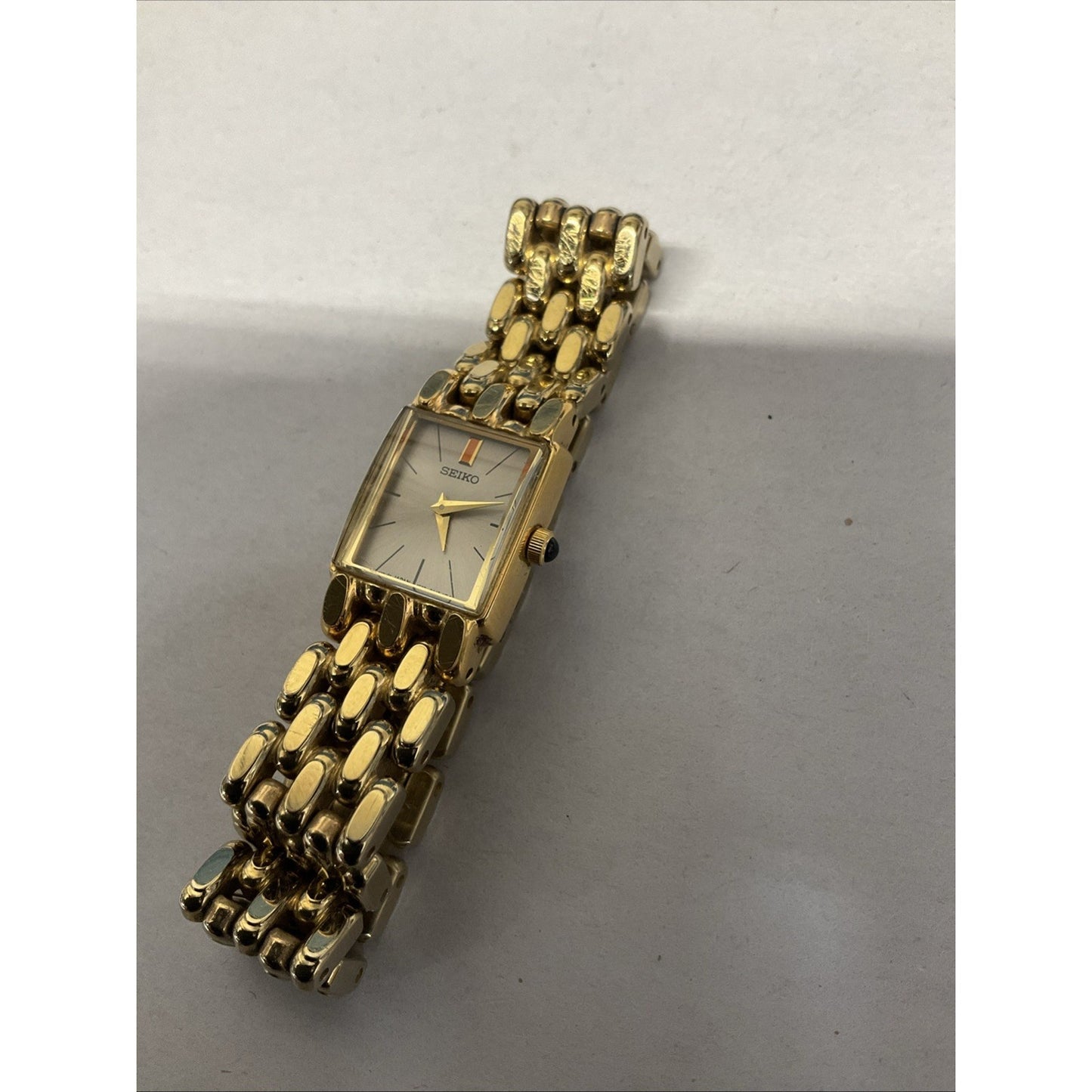 Vintage Seiko 244096 Petite Yellow Gold Tone Classic 13mm Small Tank watch