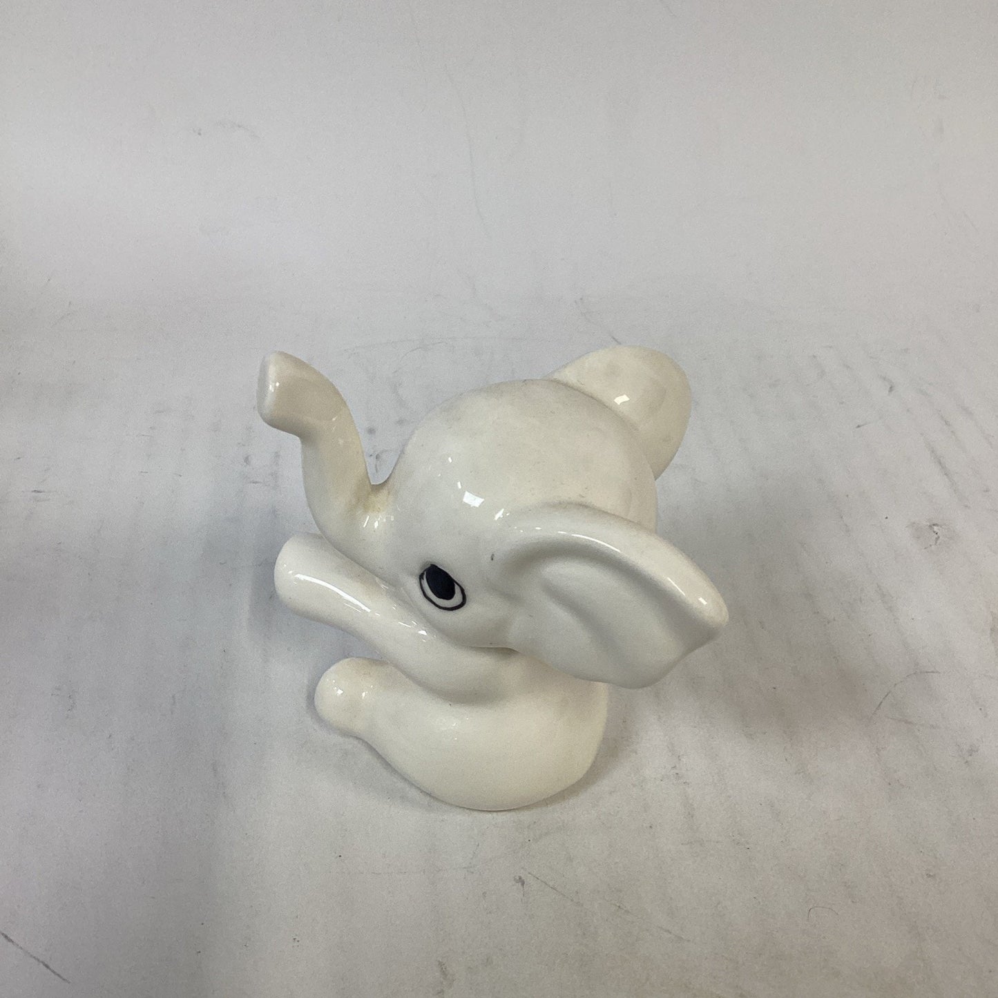 Lot of 3 Elephants - Candle, Figurine And Pin