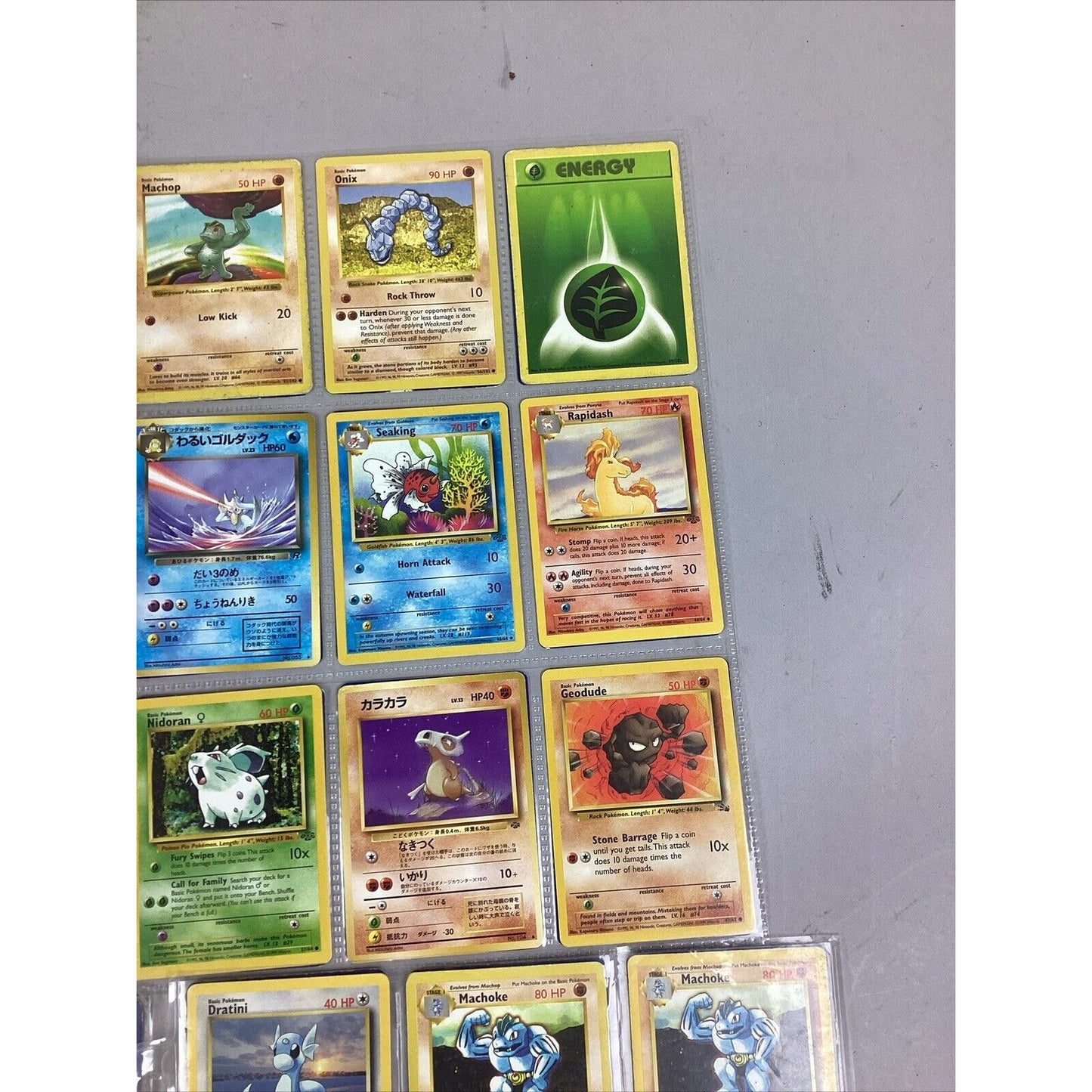 Lot Of 105 Collectible Pokémon Cards & 1 Sheet of Pokémon Stickers