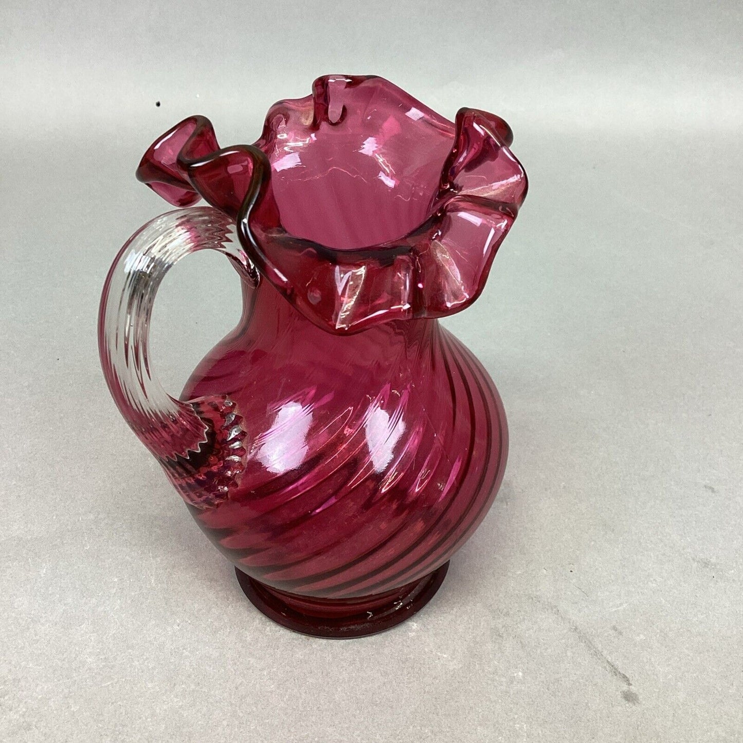 Fenton Cranberry Spiral Swirl Crimped Rim Glass Pitcher W/ Clear Handle - 5.5”H