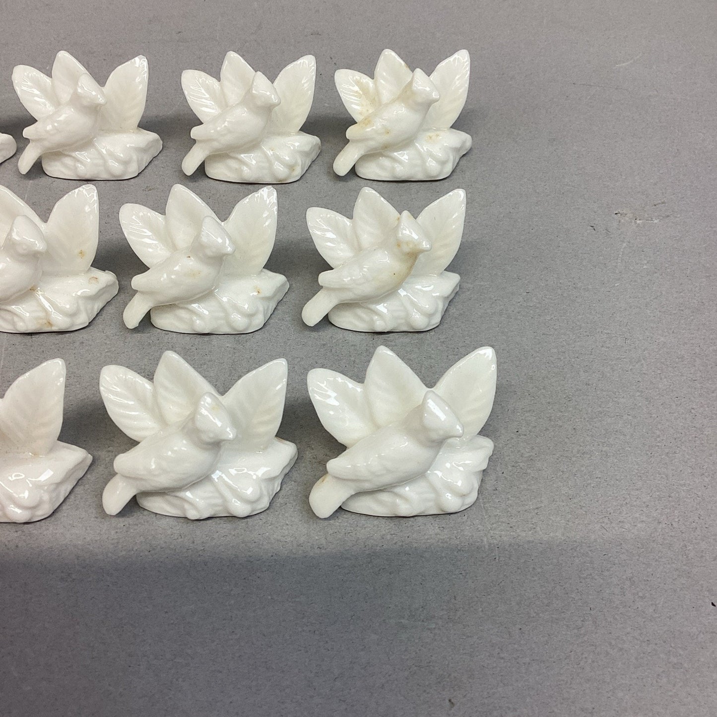 Set Of 12 Blue Jay Decorative Porcelain Figurines