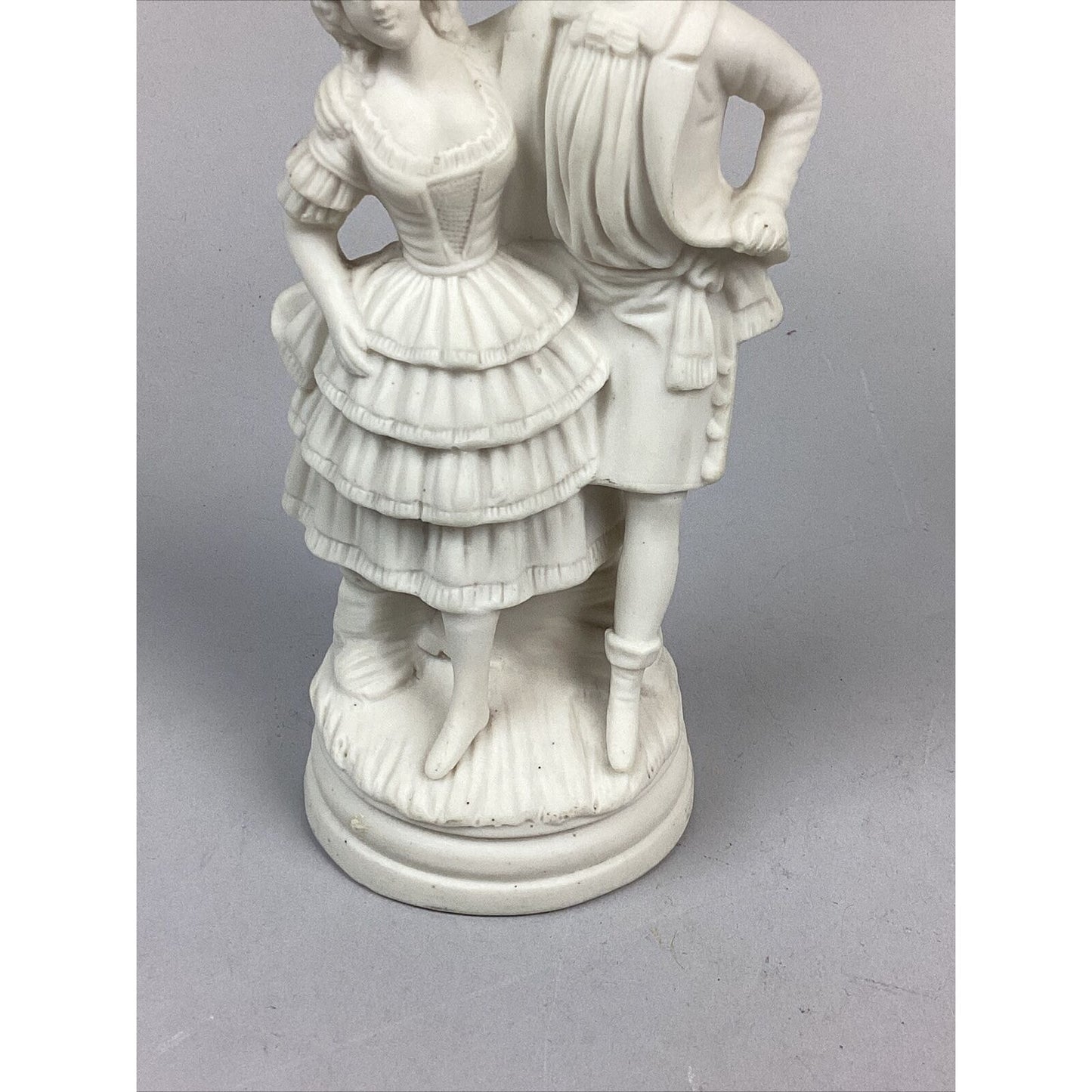 2 Antique Bisque Porcelain Figurines