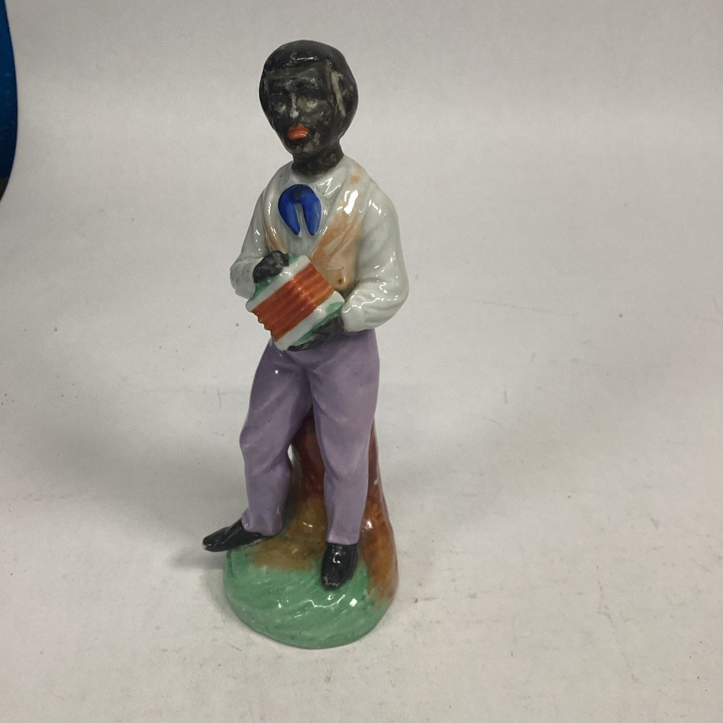 Victorian Era Staffordshire Figurine Of A Man Playing An Accordion